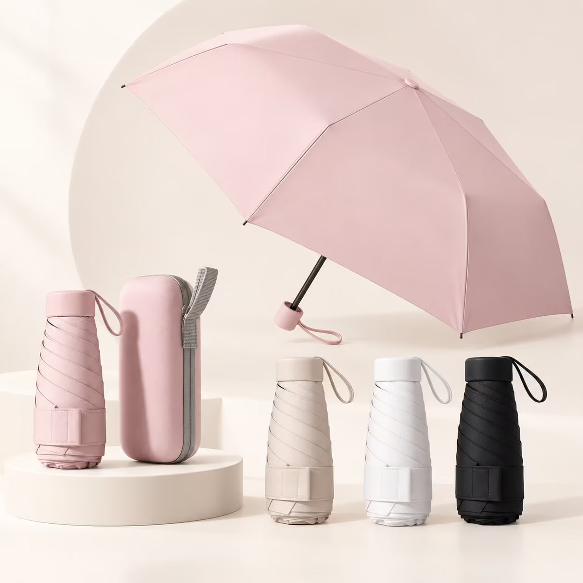 Mini Guarda-Chuva Cápsula UPF50+ – Compacto para Bolsa
