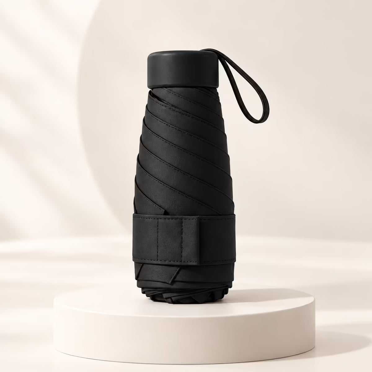 Mini Guarda-Chuva Cápsula UPF50+ – Compacto para Bolsa